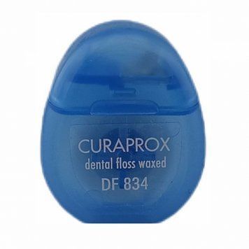 Нитка міжзубна вощена з ароматом м'яти Curaprox 5 м фото